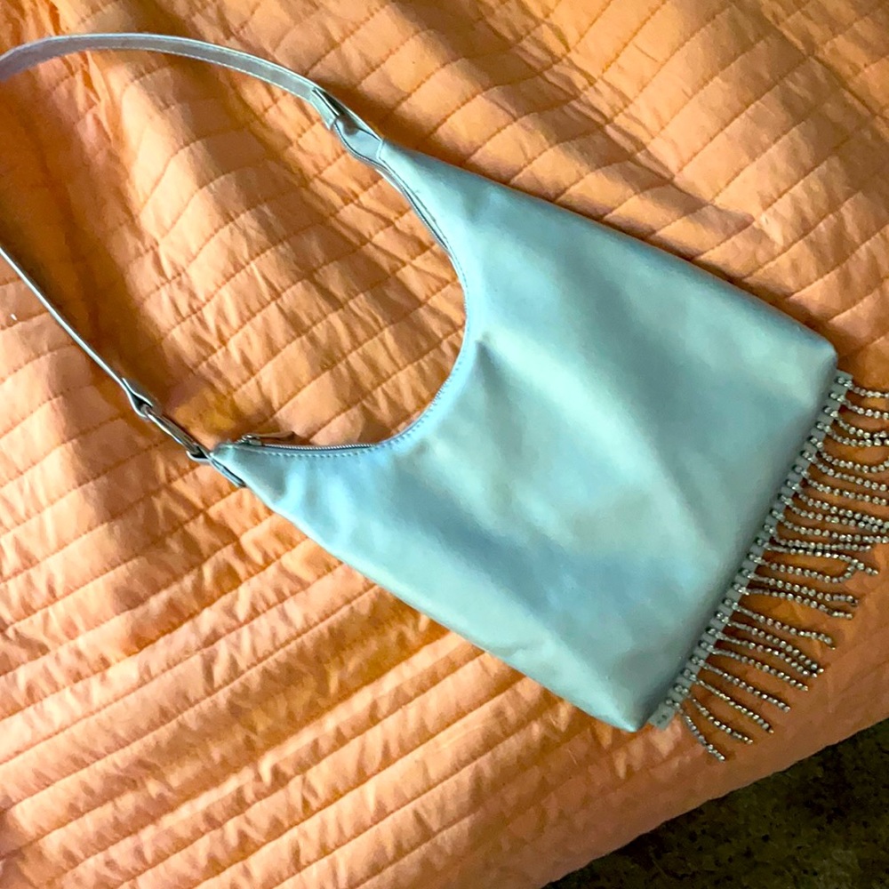 Silver purse with rhinestone tassels